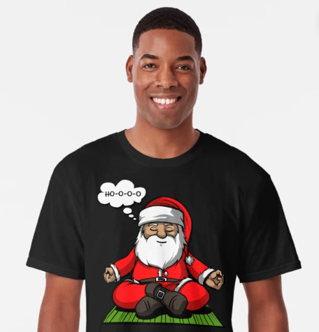 a male wearing a christmas yoga shirt with santa in the easy pose saying Hoooo